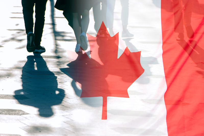 Decorative image of Canadian flag superimposed over people walking.